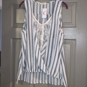 Brand new sleeveless top with lace insert detail